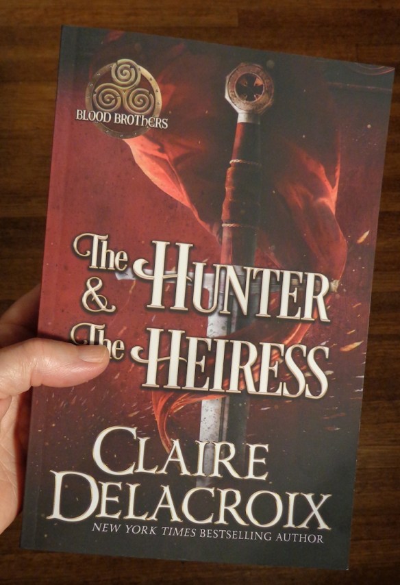 new trade paperback of The Hunter & the Heiress by Claire Delacroix with duplex cover