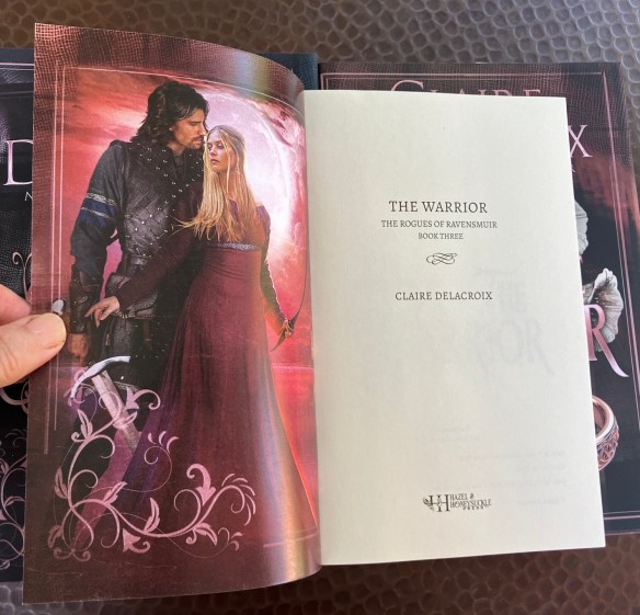 duplexed cover of the new trade paeprback edition of The Warrior